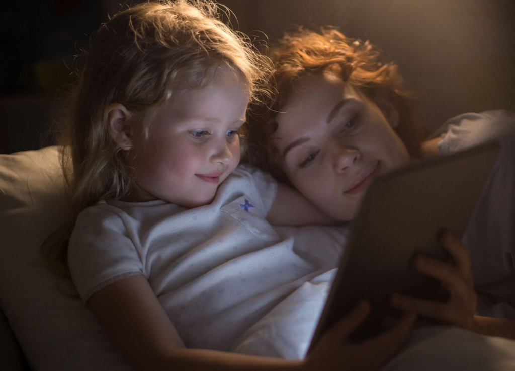Mother and child reading bedtime story