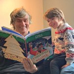 Personalised holiday storybook read by grandparent and child at home