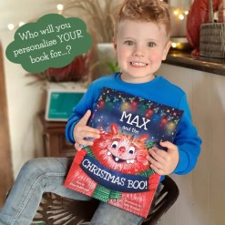 A young reader holding his fun festive story – joyful moment