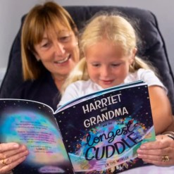 Grandma and child reading our personalised book together
