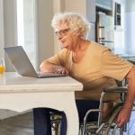 Disabled older lady using the computer