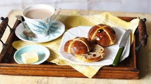 cup of tea and a hot cross bun
