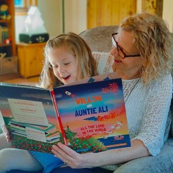 child & adult reading all the love