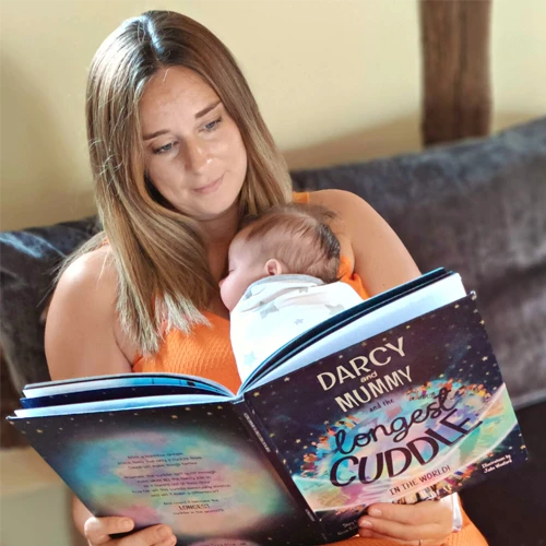 Mummy & baby reading The Longest Cuddle