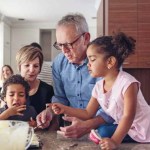 Children baking with Grandparents